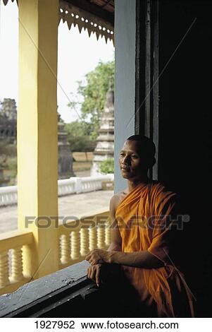Monk Leaning At Window Frame, Thinking; Angkor Wat, Siem Reap, Cambodia View Large Photo Image Stock Image - Monk Leaning At Window Frame, Thinking; Angkor Wat, Siem Reap, Cambodia. Fotosearch