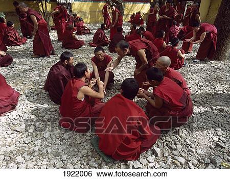 Stock Photograph - Monks Debating On Courtyard. Fotosearch