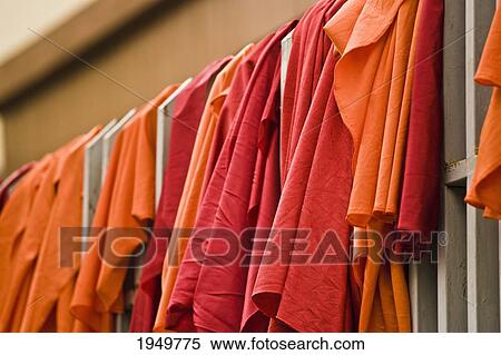 Stock Photography - Monk's Robes Hung Out To Dry; Phnom Penh Cambodia. Fotosearch