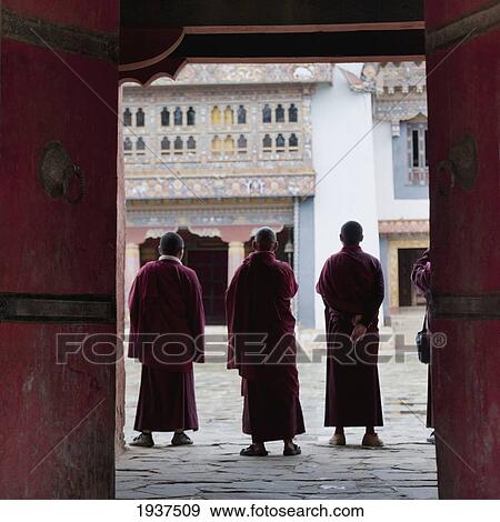 Monks Standing In A Row In Gangte Goemba Monastery; Bhutan View Large Photo Image Stock Photo - Monks Standing In A Row In Gangte Goemba Monastery; Bhutan. Fotosearch
