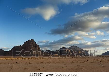 Monolithic rockscape of Wadi Rum, also known as the Valley of the Moon; Jordan View Large Photo Image Stock Image - Monolithic rockscape of Wadi Rum, also known as the Valley of the Moon; Jordan. Fotosearch