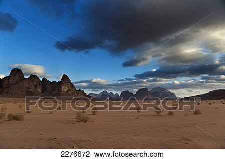 Monolithic rockscape of Wadi Rum, also known as the Valley of the Moon; Jordan View Large Photo Image Stock Image - Monolithic rockscape of Wadi Rum, also known as the Valley of the Moon; Jordan. Fotosearch