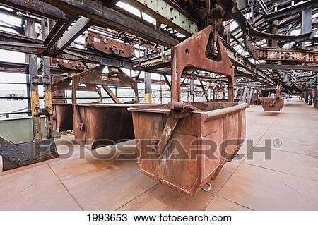 Monorail cars on the top platform of Volklinger Hutte (Volklingen Ironworks), Volklingen, Germany View Large Photo Image Stock Image - Monorail cars on the top platform of Volklinger Hutte (Volklingen Ironworks), Volklingen, Germany. Fotosearch