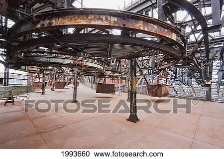 Stock Image - Monorail cars on the top platform of Volklinger Hutte (Volklingen Ironworks), Volklingen, Germany. Fotosearch