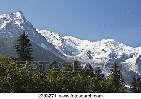Mont Blanc Massif mountain range, with Aiguille du Midi on left, and Mont Blanc in centre; France View Large Photo Image Stock Image - Mont Blanc Massif mountain range, with Aiguille du Midi on left, and Mont Blanc in centre; France. Fotosearch