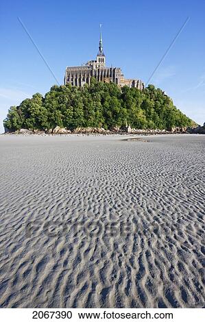 Stock Image - Mont-Saint-Michel And Mudflats In The Bay, As Seen From The North, France. Fotosearch