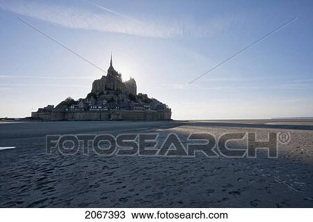 Stock Image - Mont-Saint-Michel And Mudflats In The Bay, As Seen From The East, France. Fotosearch