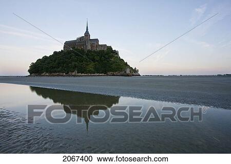 Mont-Saint-Michel And Mudflats In The Bay At Dusk, As Seen From The North, France View Large Photo Image Stock Image - Mont-Saint-Michel And Mudflats In The Bay At Dusk, As Seen From The North, France. Fotosearch