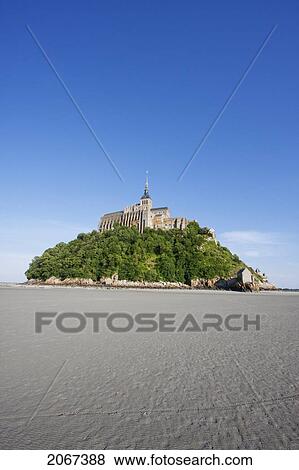 Mont-Saint-Michel And Mudflats In The Bay, As Seen From The West, France View Large Photo Image Stock Photo - Mont-Saint-Michel And Mudflats In The Bay, As Seen From The West, France. Fotosearch