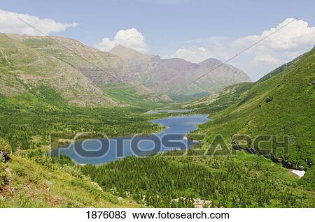 Stock Image - Montana, United States Of America; Bullhead Lake And Swiftcurrent Creek Valley In Glacier National Park. Fotosearch