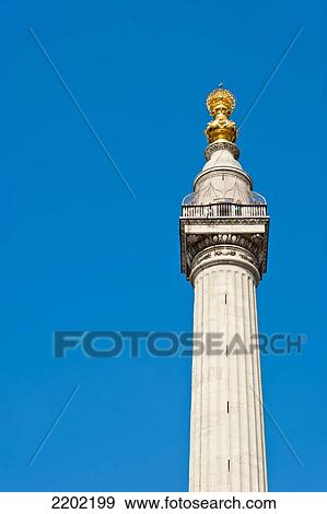 Monument To The Great Fire Of London, 202 Ft Tall Stone Roman Doric Column Marking The Site Where The Fire Started, London, Uk View Large Photo Image Stock Photo - Monument To The Great Fire Of London, 202 Ft Tall Stone Roman Doric Column Marking The Site Where The Fire Started, London, Uk. Fotosearch