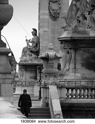 Monument With Man Walking Down Stairs; Paris, France View Large Photo Image Picture - Monument With Man Walking Down Stairs; Paris, France. Fotosearch