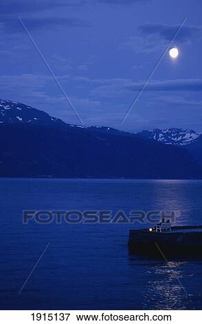 Stock Photo - Moonrise Over Sognefjord. Fotosearch