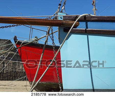 Stock Photo - Moored Boats At The Old Quay, Hugh Town. St Mary's, Isles Of Scilly, Cornwall, Uk, Europe. Fotosearch