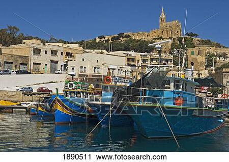 Stock Image - Moored Fishing Boats At Mgarr Harbor. Fotosearch
