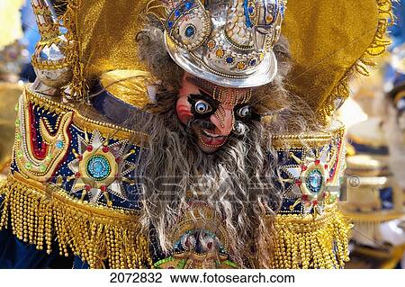 Morenada Dancer Wearing An Elaborate Mask And Costume In The Procession Of The Carnaval De Oruro, Oruro, Bolivia View Large Photo Image Stock Image - Morenada Dancer Wearing An Elaborate Mask And Costume In The Procession Of The Carnaval De Oruro, Oruro, Bolivia. Fotosearch