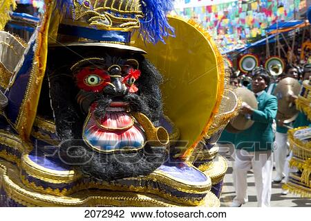 Morenada Dancer Wearing An Elaborate Mask And Costume In The Procession Of The Carnaval De Oruro, Oruro, Bolivia View Large Photo Image Stock Image - Morenada Dancer Wearing An Elaborate Mask And Costume In The Procession Of The Carnaval De Oruro, Oruro, Bolivia. Fotosearch