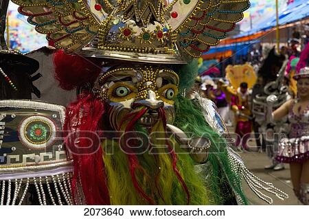 Morenada Dancer Wearing An Elaborate Mask And Costume In The Procession Of The Carnaval De Oruro, Oruro, Bolivia View Large Photo Image Stock Image - Morenada Dancer Wearing An Elaborate Mask And Costume In The Procession Of The Carnaval De Oruro, Oruro, Bolivia. Fotosearch