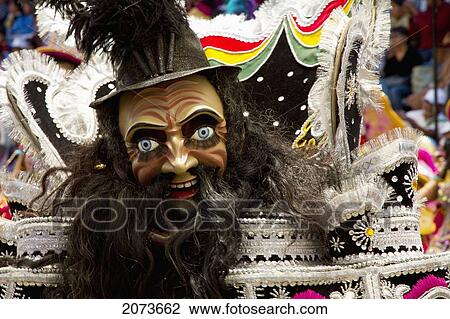 Morenada Dancer Wearing An Elaborate Mask And Costume In The Procession Of The Carnaval De Oruro, Oruro, Bolivia View Large Photo Image Stock Image - Morenada Dancer Wearing An Elaborate Mask And Costume In The Procession Of The Carnaval De Oruro, Oruro, Bolivia. Fotosearch