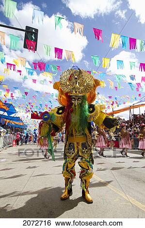 Morenada Dancer Wearing An Elaborate Mask And Costume In The Procession Of The Carnaval De Oruro, Oruro, Bolivia View Large Photo Image Stock Photograph - Morenada Dancer Wearing An Elaborate Mask And Costume In The Procession Of The Carnaval De Oruro, Oruro, Bolivia. Fotosearch