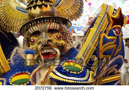 Morenada Dancer Wearing An Elaborate Mask And Costume In The Procession Of The Carnaval De Oruro, Oruro, Bolivia View Large Photo Image Stock Photograph - Morenada Dancer Wearing An Elaborate Mask And Costume In The Procession Of The Carnaval De Oruro, Oruro, Bolivia. Fotosearch