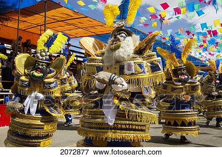 Morenada Dancers Wearing Elaborate Masks And Costumes In The Procession Of The Carnaval De Oruro, Oruro, Bolivia View Large Photo Image Stock Photo - Morenada Dancers Wearing Elaborate Masks And Costumes In The Procession Of The Carnaval De Oruro, Oruro, Bolivia. Fotosearch