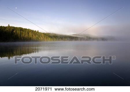 Morning Mist With Rising Moon Over Smoke Lake, Algonquin Park, Ontario View Large Photo Image Stock Image - Morning Mist With Rising Moon Over Smoke Lake, Algonquin Park, Ontario. Fotosearch