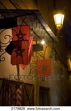 Stock Photo - Moroccan national flags hanging in the Medina; Marrakesh, Morocco. Fotosearch