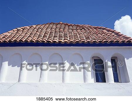 Stock Photography - Moroccan Riad, Whitewashed Exterior With Terracotta Tiled Roof. Fotosearch