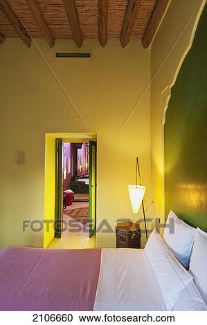 Stock Image - Morocco, Bedroom of Dar Ahlam Hotel; Skoura. Fotosearch