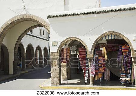 Stock Photo - Morocco, Casablanca, Colorful goods hanging on display for sale in Quartier Habbous. Fotosearch