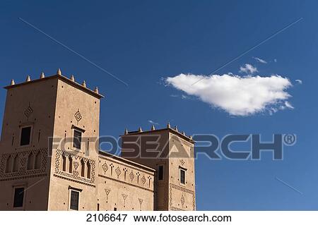 Morocco, Cloud and main kasbah of Dar Ahlam Hotel; Skoura View Large Photo Image Stock Photo - Morocco, Cloud and main kasbah of Dar Ahlam Hotel; Skoura. Fotosearch
