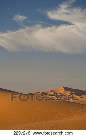 Morocco, Clouds over sand dunes in Erg Chebbi area; Sahara Desert near Merzouga View Large Photo Image Stock Photograph - Morocco, Clouds over sand dunes in Erg Chebbi area; Sahara Desert near Merzouga. Fotosearch