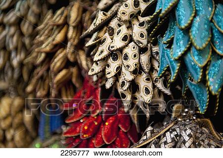Stock Photo - Morocco, Colorful keyrings of babouche slippers for sale in souks; Fez. Fotosearch