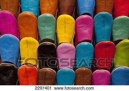 Stock Image - Morocco, Colorful selection of Babouche slippers for sale in souk; Marrakesh. Fotosearch