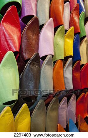 Stock Image - Morocco, Colorful selection of Babouche slippers for sale in souk; Marrakesh. Fotosearch