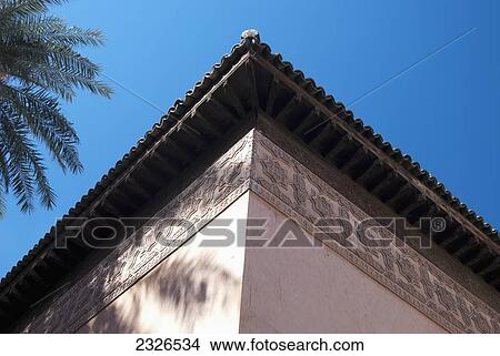 Picture - Morocco, Cornice elaborately decorated with islamic traditional engravings at Saadian Tombs garden; Marrakech. Fotosearch