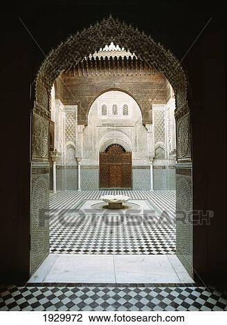 Stock Image - Morocco, Courtyard of Medersa El Attarin in Old town; Fez. Fotosearch