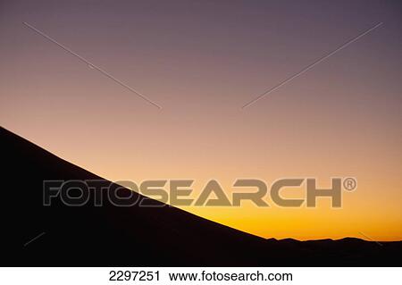 Morocco, Crescent moon above sand dune at dusk near Merzouga in Sahara Desert; Erg Chebbi area View Large Photo Image Stock Image - Morocco, Crescent moon above sand dune at dusk near Merzouga in Sahara Desert; Erg Chebbi area. Fotosearch