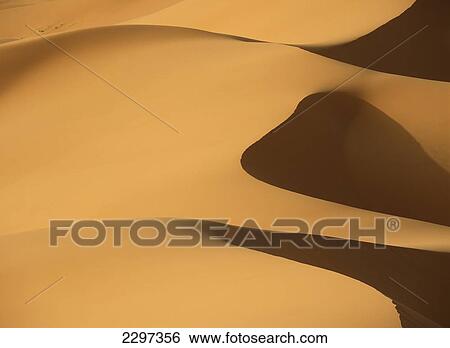 Morocco, Detail of sand dunes at dawn in Erg Chebbi area; Sahara Desert near Merzouga View Large Photo Image Stock Photograph - Morocco, Detail of sand dunes at dawn in Erg Chebbi area; Sahara Desert near Merzouga. Fotosearch