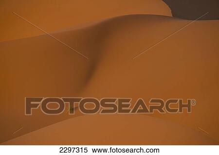 Stock Photography - Morocco, Detail of sand dunes at dawn in Erg Chebbi area; Sahara Desert near Merzouga. Fotosearch