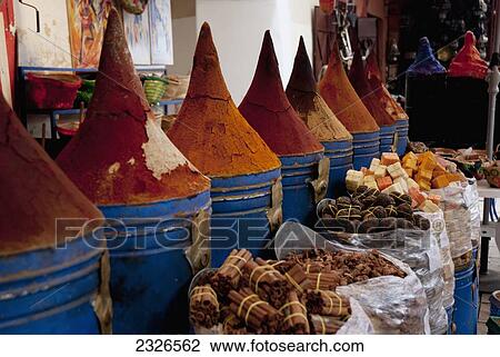 Stock Image - Morocco, eye shadow; Marrakech, soap blocks, Spices stall. Fotosearch