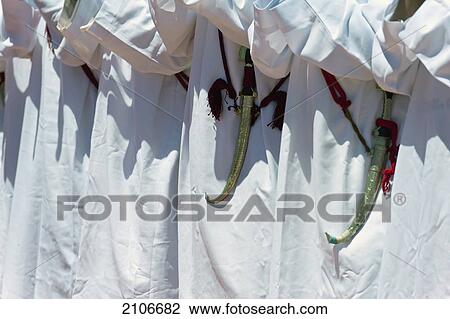Morocco, Kalaat M'Gouna; Valley of Roses, Close up of Berber men singing and dancing at Festival of Roses View Large Photo Image Stock Image - Morocco, Kalaat M'Gouna; Valley of Roses, Close up of Berber men singing and dancing at Festival of Roses. Fotosearch