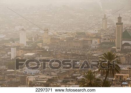 Morocco, Looking down to Kairaouine Mosque and medina of Fez at dawn; Fez View Large Photo Image Stock Image - Morocco, Looking down to Kairaouine Mosque and medina of Fez at dawn; Fez. Fotosearch