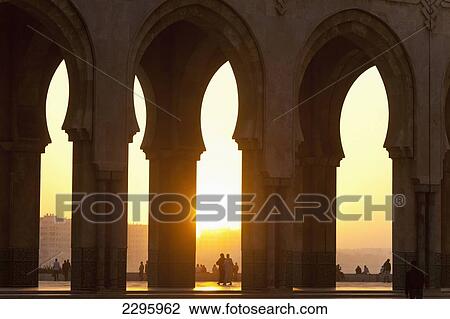 Morocco, Looking through arches of Hassan II mosque at dusk; Casablanca View Large Photo Image Stock Image - Morocco, Looking through arches of Hassan II mosque at dusk; Casablanca. Fotosearch