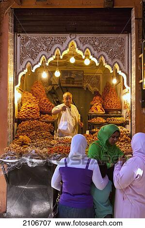 Stock Photo - Morocco, Man selling pastry; Marrakech. Fotosearch