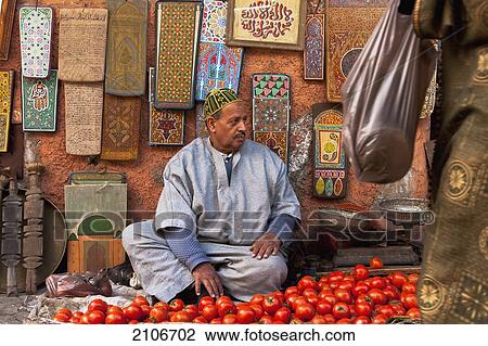 Morocco, Man selling tomatoes at souk; Marrakech View Large Photo Image Stock Image - Morocco, Man selling tomatoes at souk; Marrakech. Fotosearch