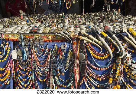 Stock Image - Morocco, Marrakech, Medina, Colorful jewelry on display. Fotosearch