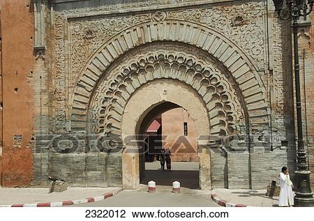 Morocco, Marrakech, Medina, Pedestrians and ornate archway in Medina View Large Photo Image Stock Image - Morocco, Marrakech, Medina, Pedestrians and ornate archway in Medina. Fotosearch