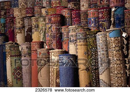 Stock Photo - Morocco, Marrakech, Traditional rugs for sale. Fotosearch